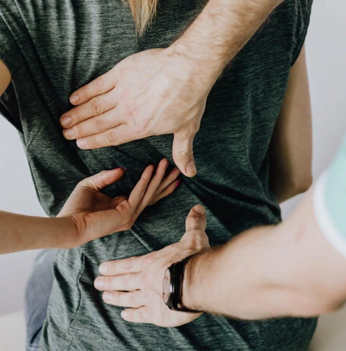 chiropractor working on women's back